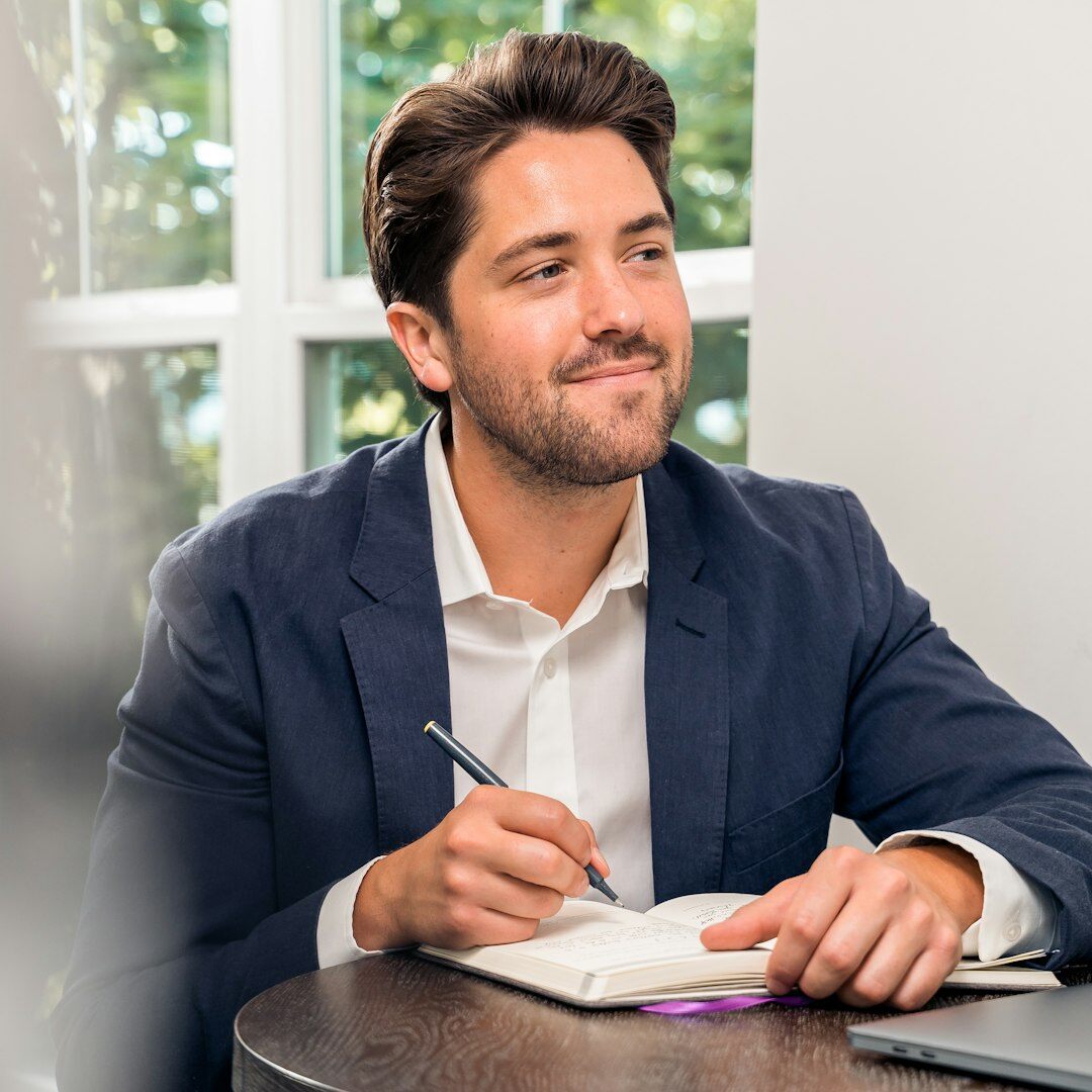 Smiling professional man with glasses