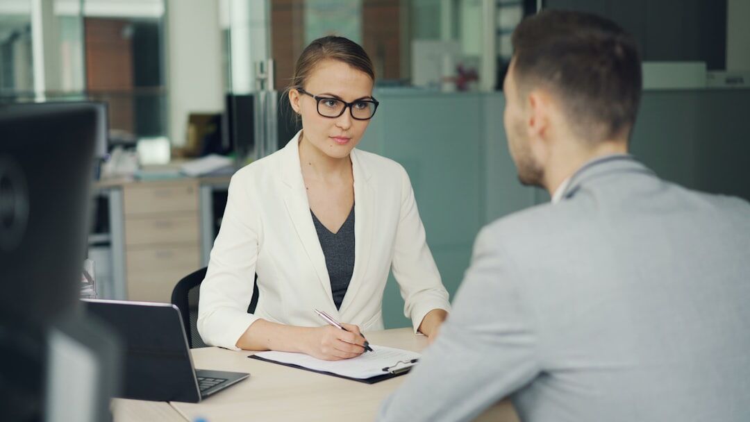 Business interview with two professionals talking