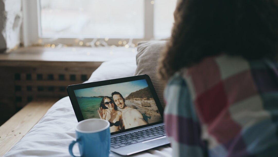 Online video conference call on laptop screen